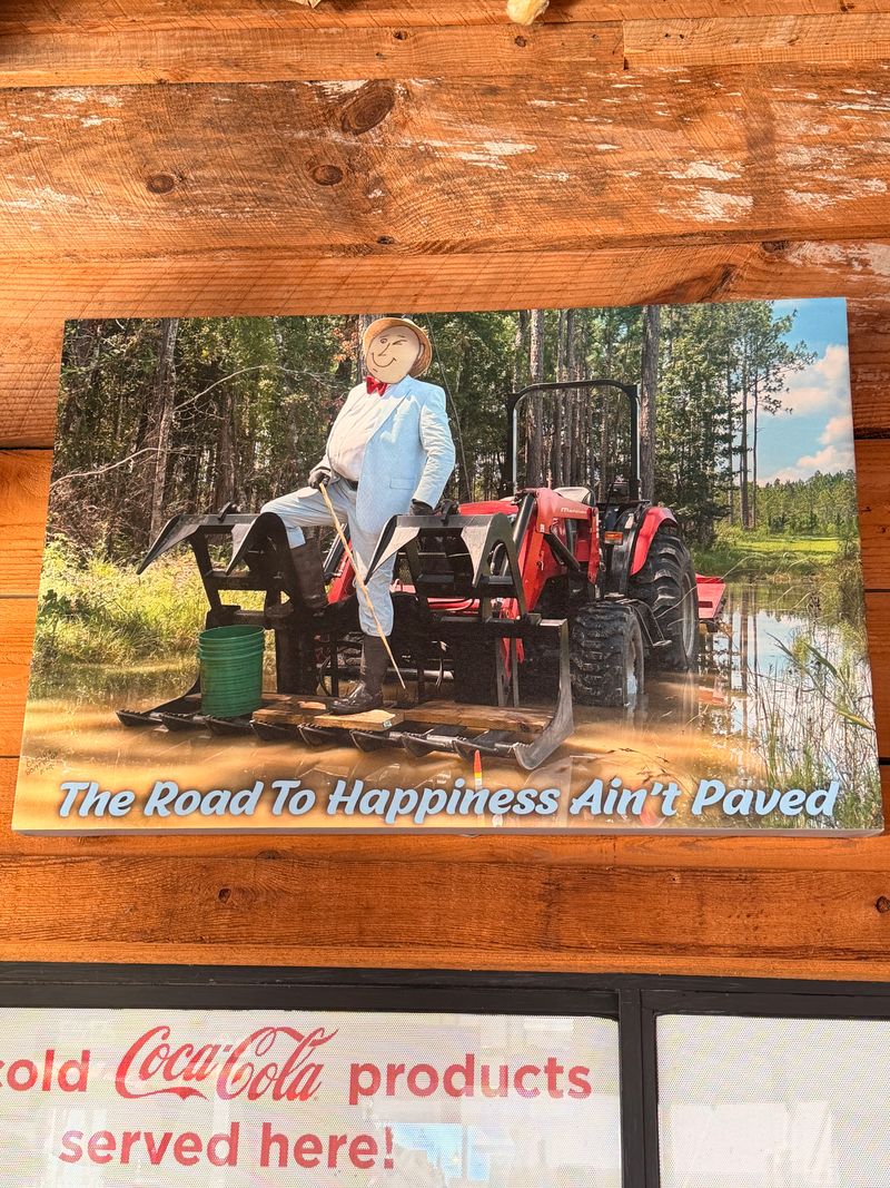 Cletus Boatright The Road to Happiness Ain’t Paved artwork at Fish Tales
